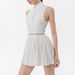 2026 New Stand-up Collar Half-zipper One-piece Tennis Skirt For Women With Chest Pad Anti-light Hollowed-out Backless Pleated Sports Skirt_ecoleips.com