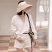 Liangyixuan 2024 Summer High-End Style New Chinese V-Neck Beaded Crochet Exquisite White Shirt Top For Women_ecoleips.com