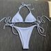2025European and American cross border new drawstring straps hollow striped split swimsuit bikini bikini_ecoleips.com