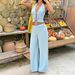 Voya Women's Lazy Vacation Style Set With Light Blue Hanging Neck Tie And Exposed Navel Top Paired With High Waist Wide Leg Pants Two-piece Set_ecoleips.com