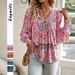 Elegant Floral Print Lantern Sleeve Blouse With Tie Detail – V-Neck, Loose Fit, Polyester-Spandex Blend – Pink, Orange, Blue_ecoleips.com