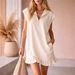 New European American Spring/Summer Sleeveless Double-Pocket Dress With Zipper V-Neck And Ruffle A-Line Skirt For_ecoleips.com
