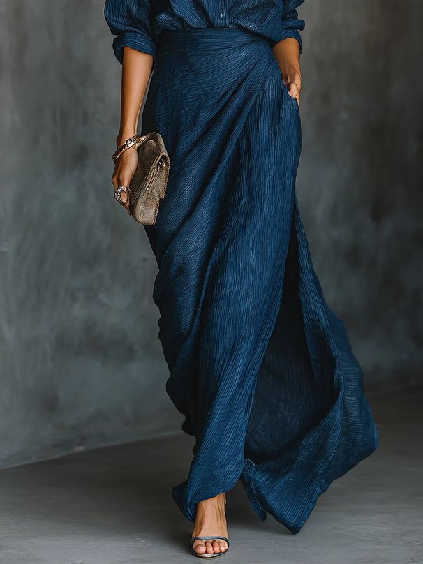 2025 Independent Website European And American Women's Autumn Elegant And Sexy Solid Color Irregular Pleated Pocket Long Skirt_ecoleips.com