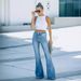 2022 European And American Jeans Autumn/Winter New High-Waisted Tassel Slim Fit Flared Pants Vintage Style_ecoleips.com