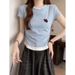 Women's Short Sleeve Crop Top – Color Blocked Mock Two-Piece Design With Ruffled Waist & Slim Fit_ecoleips.com