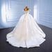 Elegant Satin Wedding Dress With Beaded Details And Flowing Train, Luxurious Bridal Gown For Women_ecoleips.com