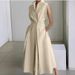 European And American Cross-Border 2024 Summer New Commuter Fashion Solid Color V-Neck Women's Button Big Hem Dress_ecoleips.com
