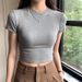 Spring And Summer New Tight Shoulder Small Crew Neck Short-sleeved T-shirt Women Slim Fold Wear High Waist Short Open Button Spice Girl Top_ecoleips.com