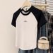 A Stylish, Short-Sleeved T-Shirt With A Curved Hem Design, Made Of Pure Cotton And Imported From Europe; Suitable For Su_ecoleips.com