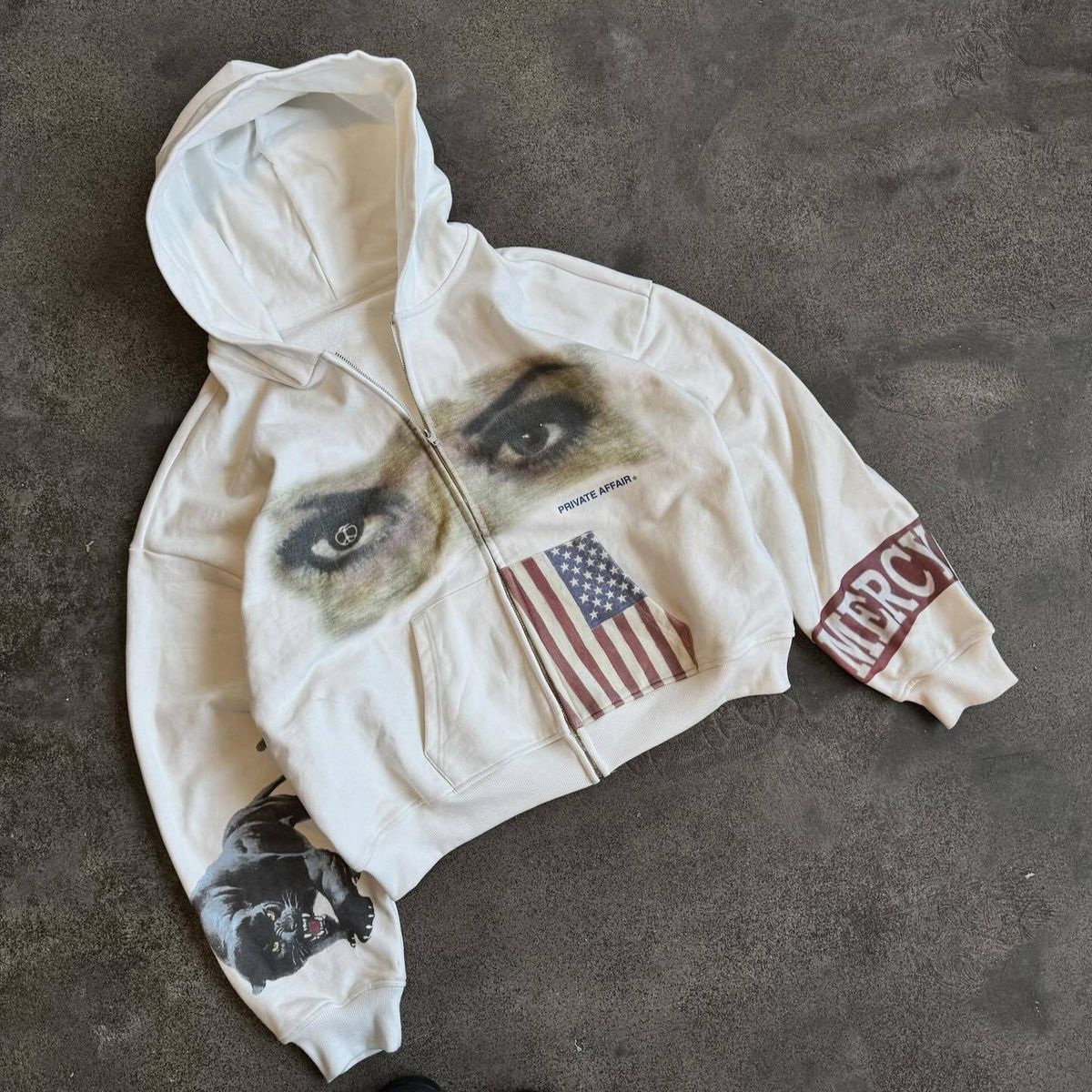 "Edgy Flag Eye Print Hoodie – Unisex Dark Streetwear, Oversized Fit, Graphic Pullover For Men & Women (White) – S/M/L/XL"_ecoleips.com