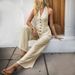 K New Simple Vacation Slimming Over-the-shoulder Solid Wide-leg Bodysuit_ecoleips.com