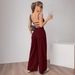 G25J090 2025 European And American High End Women's Clothing Solid Color Fashion Slightly Flared Trousers Backless Suspender Casual Jumpsuit Women's Pants_ecoleips.com