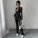 Voya Women's Black Slim Fit And Slimming Zipper Stand Up Collar Top, Slightly Flared Pants, Fashionable Two-piece Set For Women_ecoleips.com