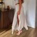 2025 New Spring Summer Casual Women's Pleated Side Slit Irregular Hem Skirt_ecoleips.com