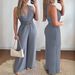 cross-border European And American Women's V-neck, Sleeveless, Diagonal Pocket, Solid Color, Sexy, Loose, Elastic_ecoleips.com