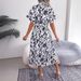 2025 Style Independent Women's Sexy V-neck Bohemian Long Sleeved Dress_ecoleips.com
