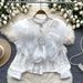 Women's Clothing Niche Light Luxury Three Dimensional Ruffle Stitching Round Neck Pearl Single Breasted Versatile Lace Crop Top_ecoleips.com