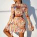 Swimsuit Women's European And American Printed Long Sleeved Korean Bikini Four Piece Set Split Blouse Beach Skirt Swimsuit_ecoleips.com