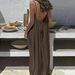 2026 Ice Silk Wrinkle Solid Color Ruched Backless Strap Long Beach Vacation Loose Home Dress_ecoleips.com