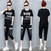 Plus Size Women's Patchwork Two Piece Set Summer Casual Loose Fit Short Sleeved Top And Capri Pants_ecoleips.com
