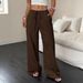 2025 Summer New Women's Casual Solid Color Textured Fabric Knotted Waist Oblique Pocket Wide Leg Pants_ecoleips.com