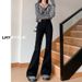 2025 New Guangzhou Xintang Washed Blue Micro Flare Jeans For Women, High Waist, Slimming, Height-Enhancing, Cotton_ecoleips.com