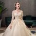 Champagne Lace Long Sleeve Wedding Dress With Cathedral Train, Plus Size Bridal Gown For Elegant Bride, Flowy A-Line Silhouette_ecoleips.com