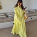 2025 Fashion Yellow Loose Long Sleeve Shirt + High Waist Skirt Set For Women_ecoleips.com