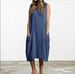 A Large-Sized Loose Cotton And Linen Sleeveless Dress In Solid Color Pocket Midi Dress_ecoleips.com