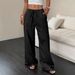 2025 Summer New Women's Casual Solid Color Textured Fabric Knotted Waist Oblique Pocket Wide Leg Pants_ecoleips.com