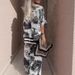 2025 European And American Style Cross-Border Independent Station Casual V-Neck Printed Short Sleeve Top Loose Wide-Leg_ecoleips.com