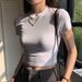 Spring And Summer New Tight Shoulder Small Crew Neck Short-sleeved T-shirt Women Slim Fold Wear High Waist Short Open Button Spice Girl Top_ecoleips.com