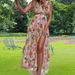 Women Stylish Casual Dress V‑Neck Sleeveless Design With Fashion Print, Self‑Tie Waist & Elegant Side Slit_ecoleips.com