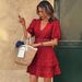 2026 European And American Fashionable V-Neck Lace-Up Waist Hollow Bubble Short-Sleeve Dress_ecoleips.com