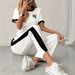 Fashion Women's Casual Two Piece Set Short Sleeved Top And Loose Fitting Trousers 8002 Print Cross Border_ecoleips.com