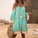 A Popular Women's Dress In Bohemian Style, Featuring Long Sleeves And Floral Prints._ecoleips.com