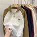 Real Shot Of Women's Casual Loose-fitting Polo Collar Sweatshirt With Contrasting Color Raglan Sleeves And Half-zip,_ecoleips.com