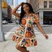 2026Women's Summer Floral Print Shirt Dress Puff Sleeve Ruffle Hem A-Line Mini Dress_ecoleips.com