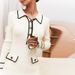 Women's Clothing Long Sleeved Lapel Button Wood Ear Edge Knitted Dress_ecoleips.com