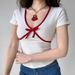 This V-Necked, Sexy Women's T-Shirt Features A Short Sleeve Design Made Of Pure Cotton, With A Bold Red Pattern That Add_ecoleips.com